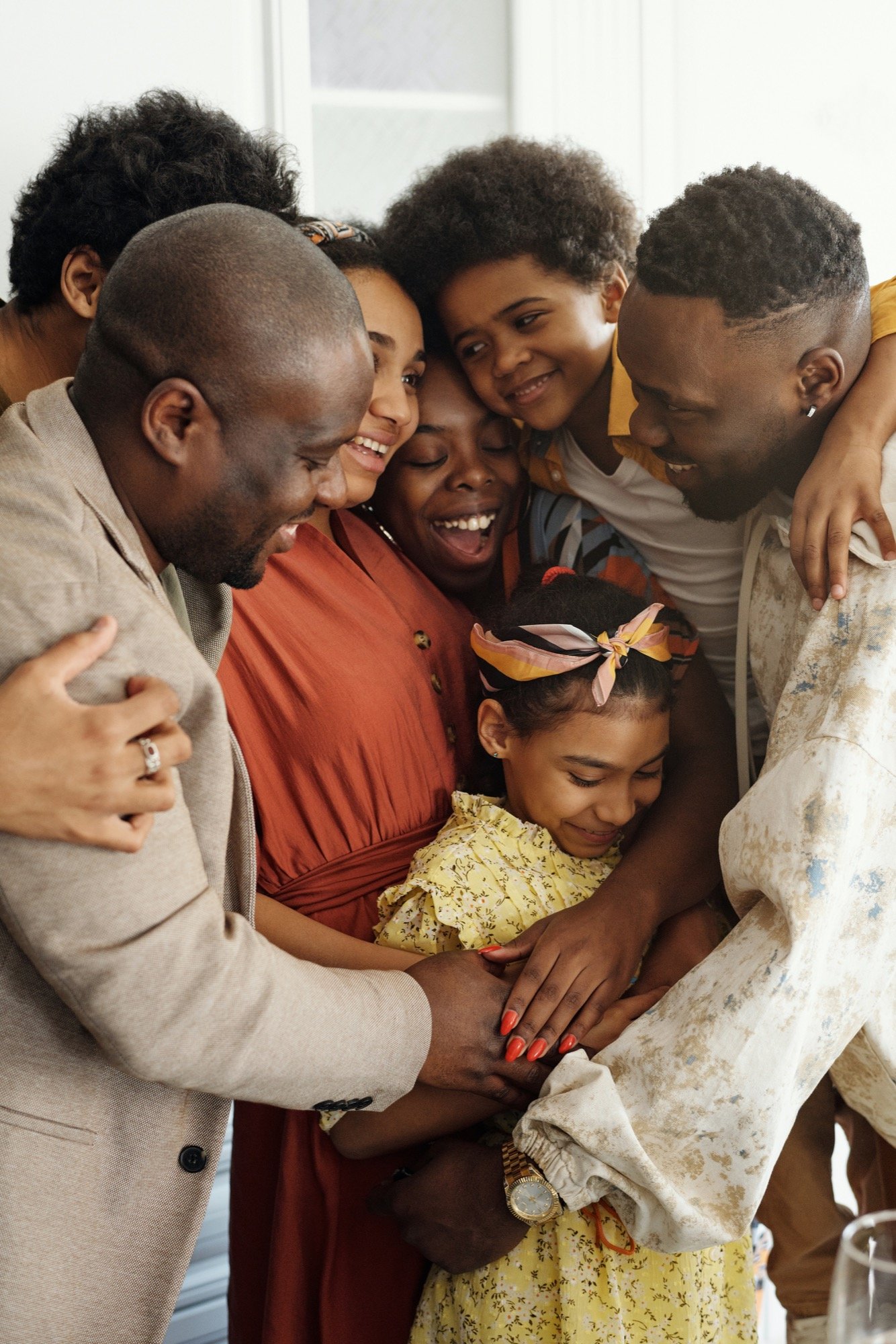 A multigenerational family laughing together