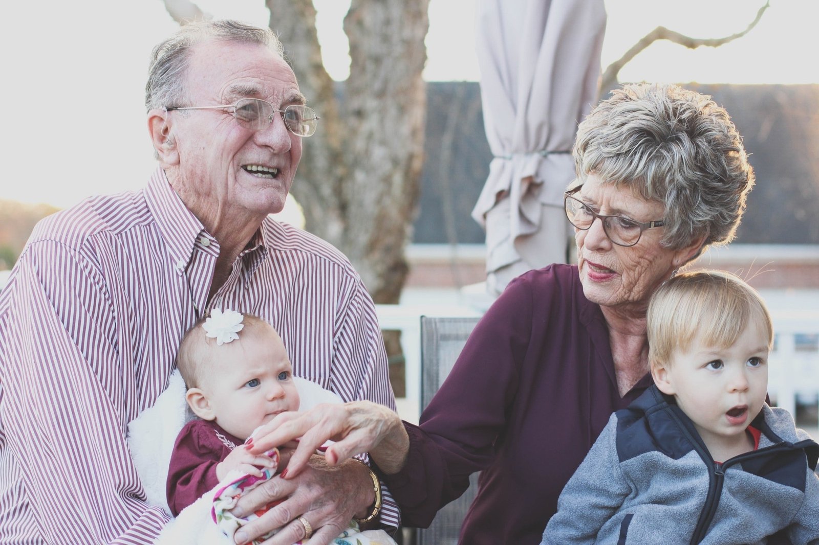 Grandparents spending time with young grandchildren